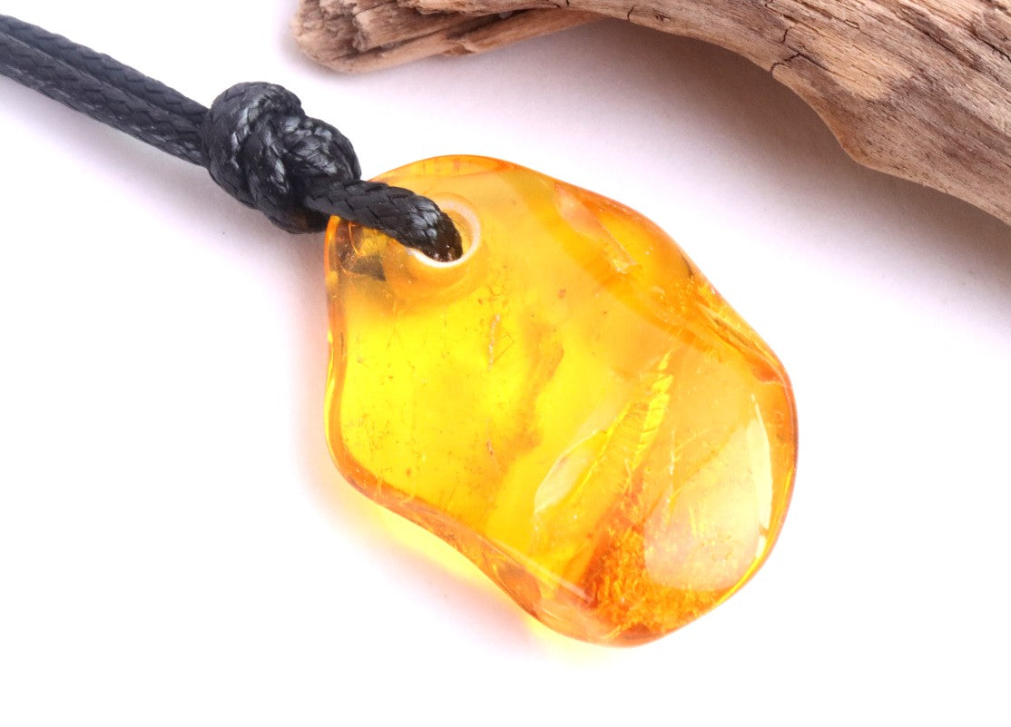 Baltic Amber Amulet with Inlusions