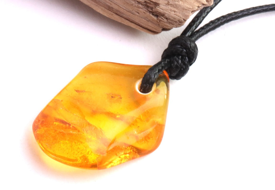 Baltic Amber Amulet with Inlusions