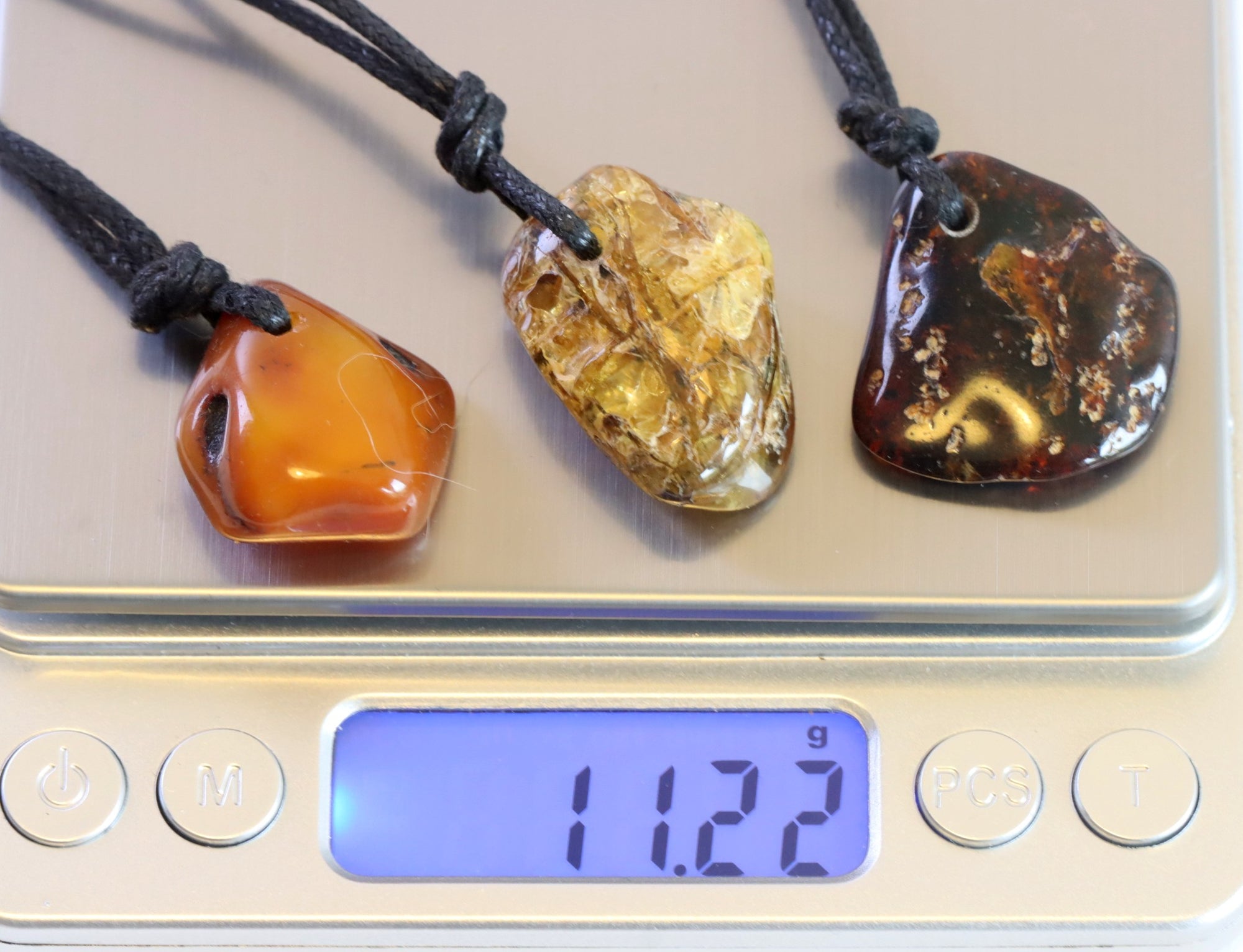 Trio of Quirky Amber Amulets