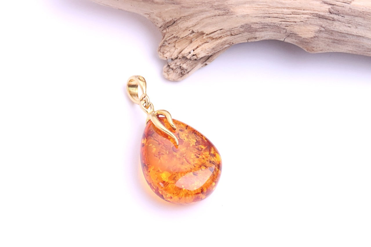 Radiant Baltic Amber Teardrop Pendant on Gold-Plated Silver