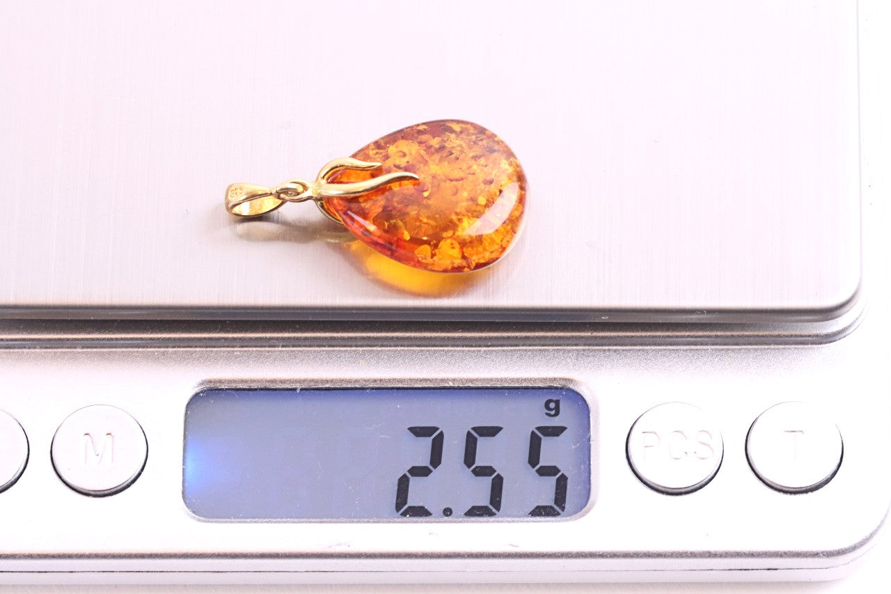 Radiant Baltic Amber Teardrop Pendant on Gold-Plated Silver