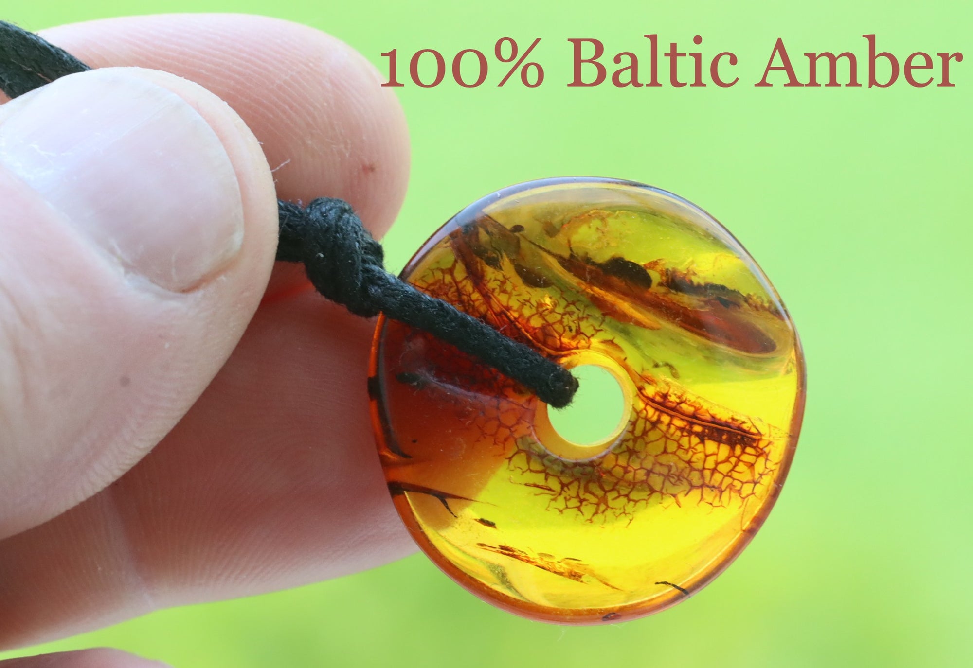 Polished Dainty Amber Donut Amulet