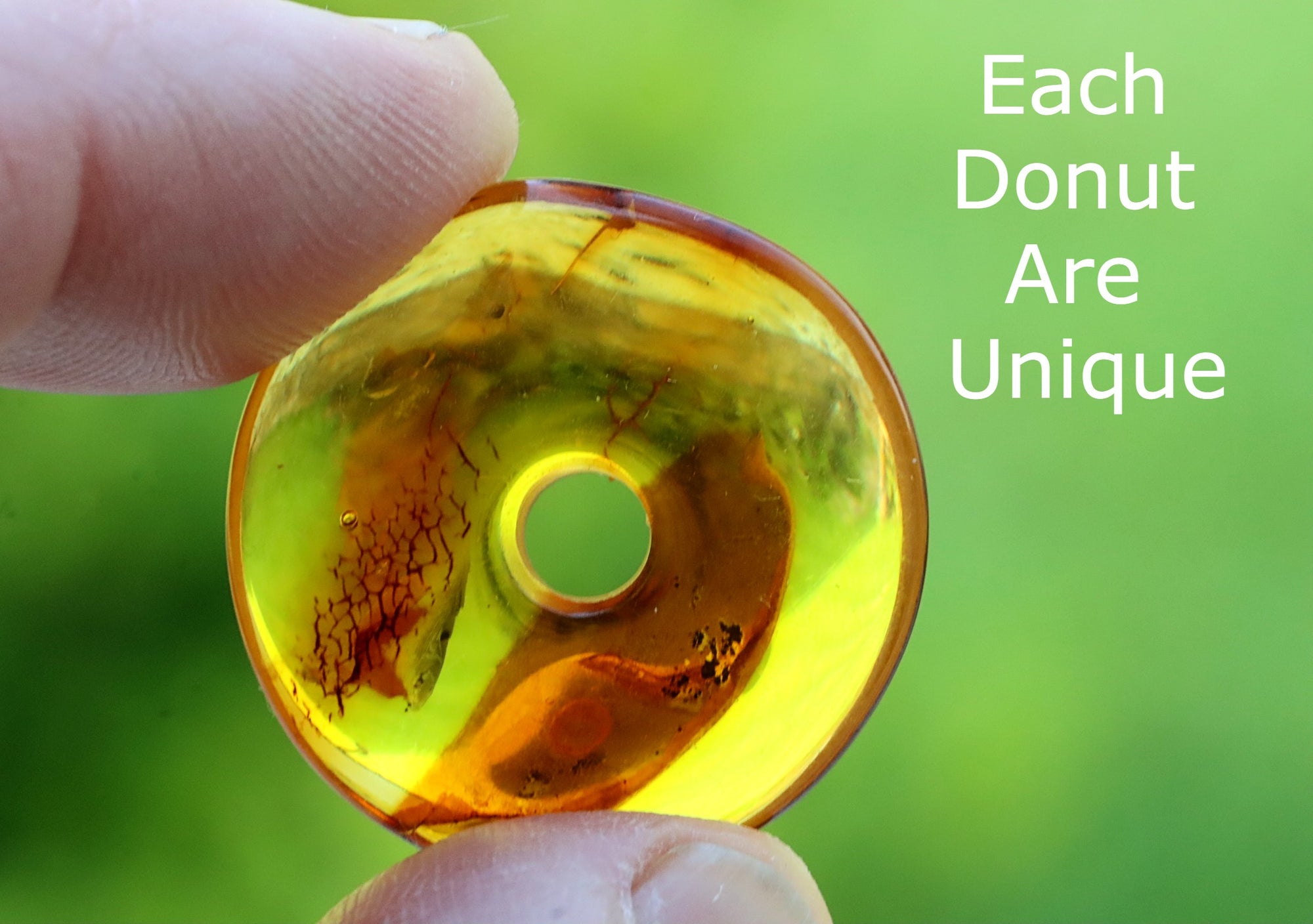 Polished Dainty Amber Donut Amulet