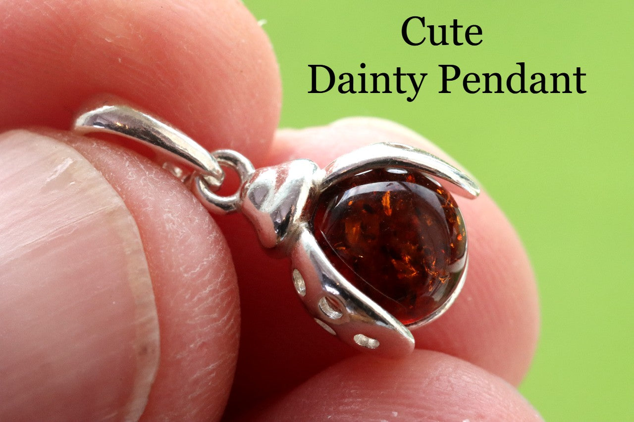 Ladybugs Amber Pendant On Sterling Silver