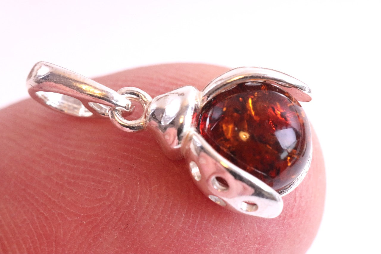 Ladybugs Amber Pendant On Sterling Silver