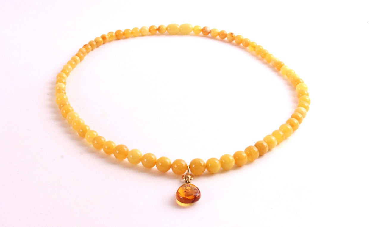 Exclusive Butterscotch Beeswax Baltic Amber Necklace with Gold-Plated Silver Pendant