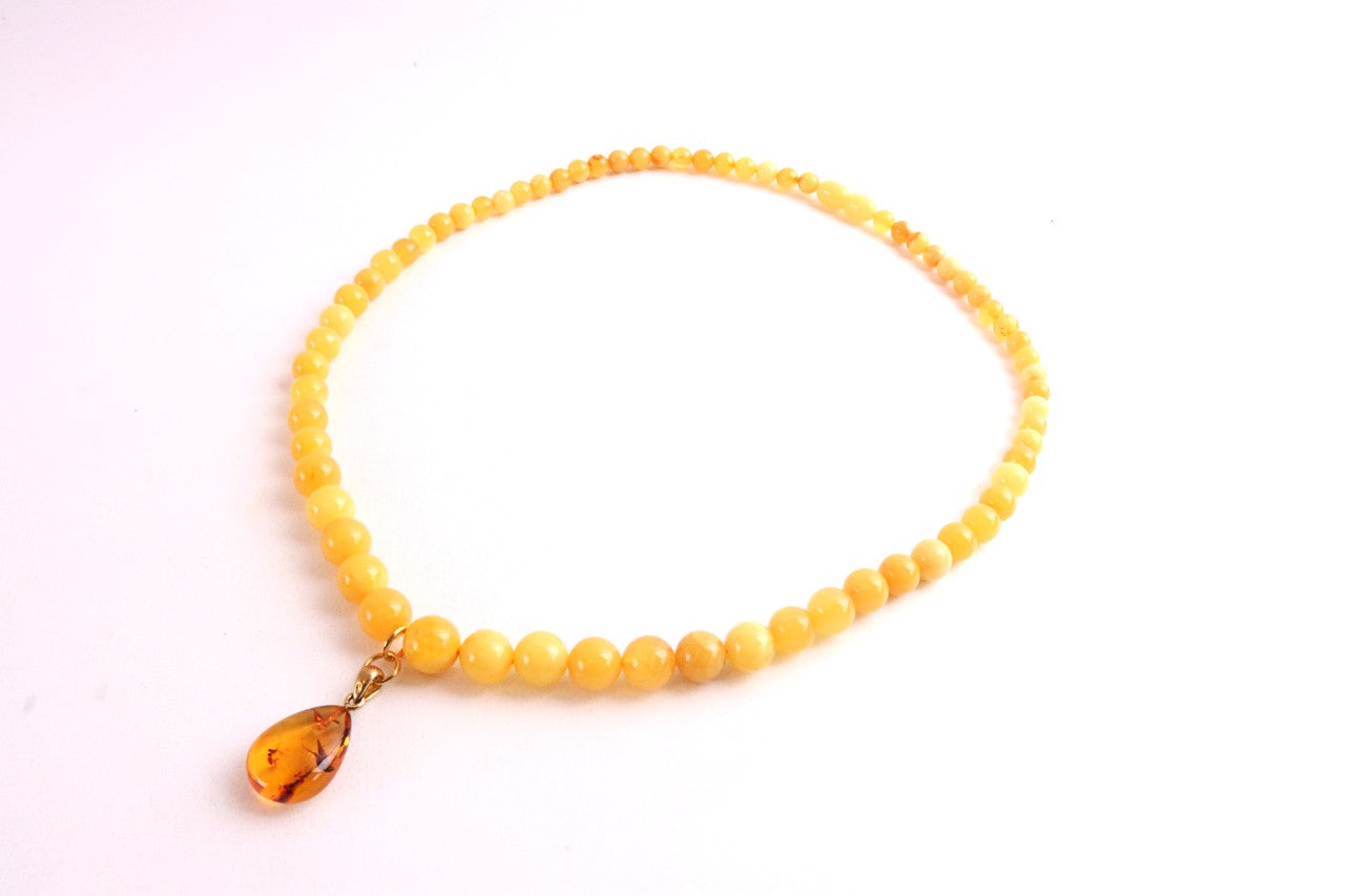 Exclusive Butterscotch Beeswax Baltic Amber Necklace with Gold-Plated Silver Pendant