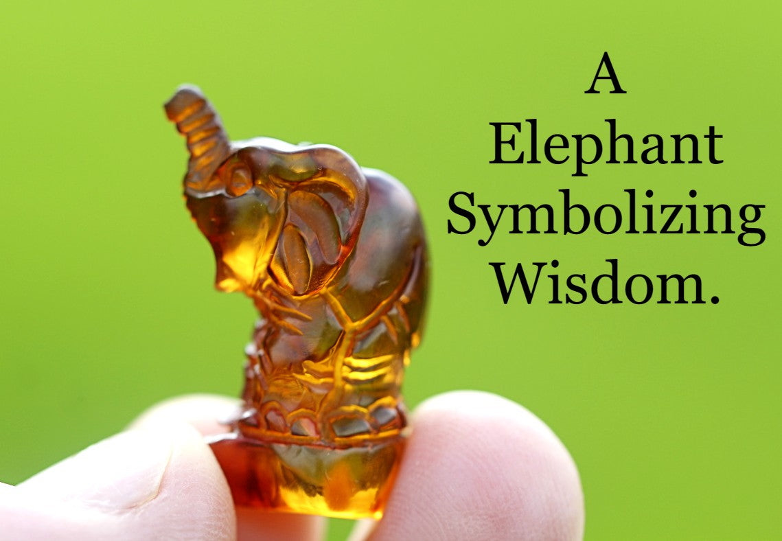 Carved Amber Elephant Figurine