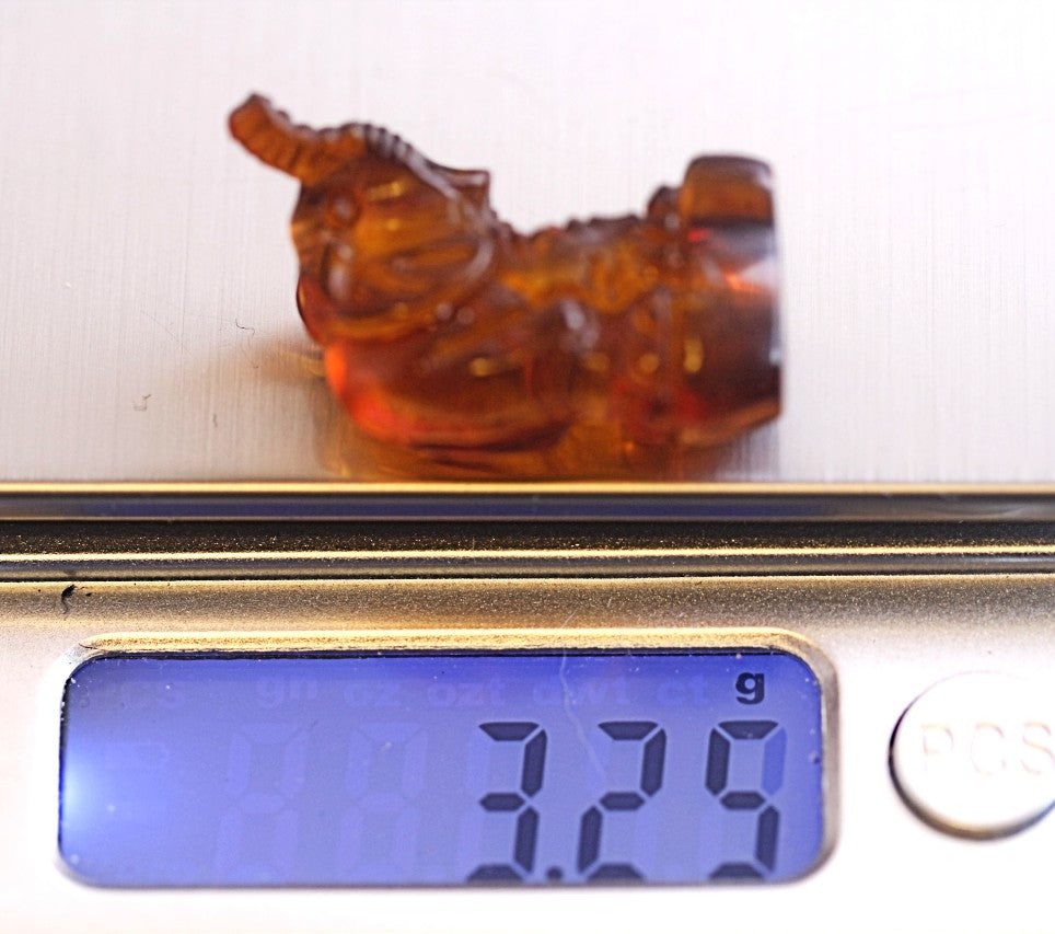 Carved Amber Elephant Figurine