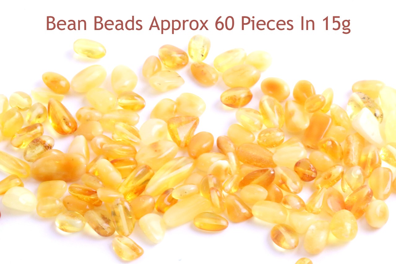 Drilled Bean shapes Approx 60 mixed color beads in each 15 grams