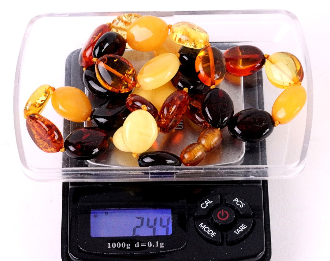 Amber Beads on Scale