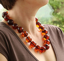 Unique Large Red Amber Necklace on Model