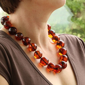 Unique Large Red Amber Necklace on Model