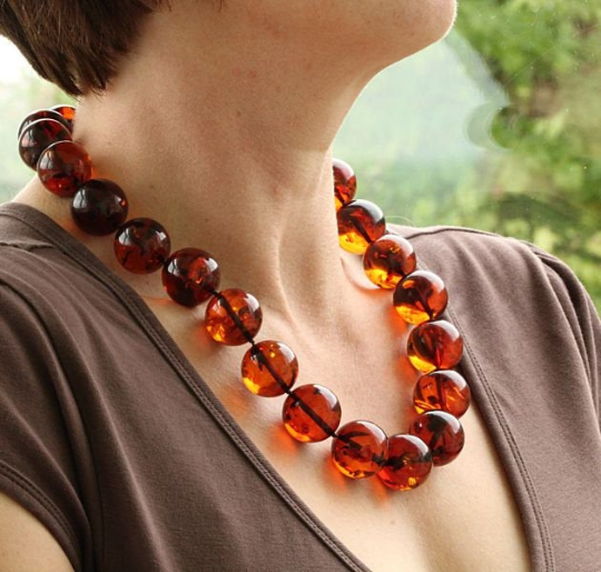 Unique Large Red Amber Necklace on Model