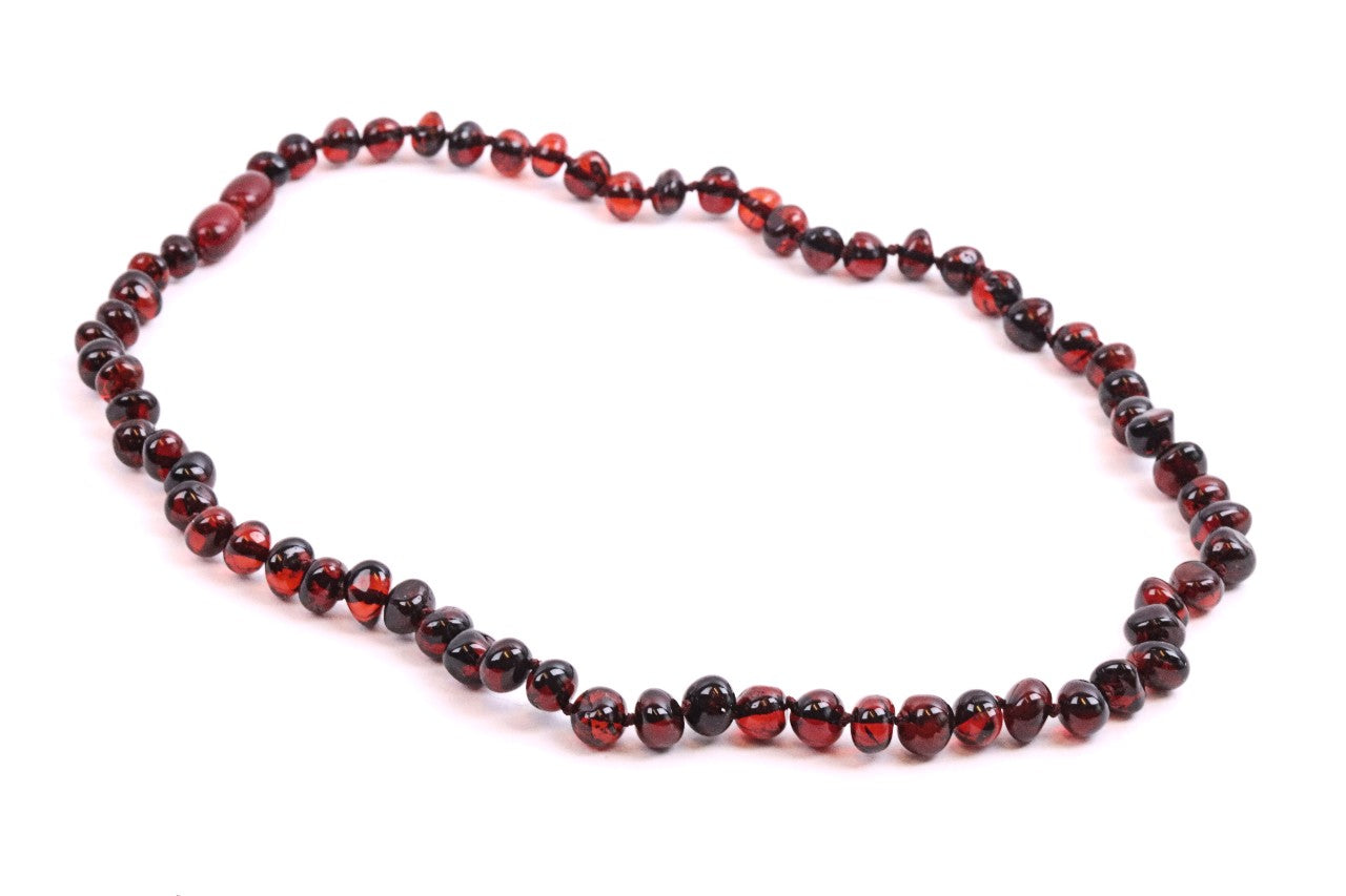 Lot 2747 - A ''cherry amber'' necklace and some loose